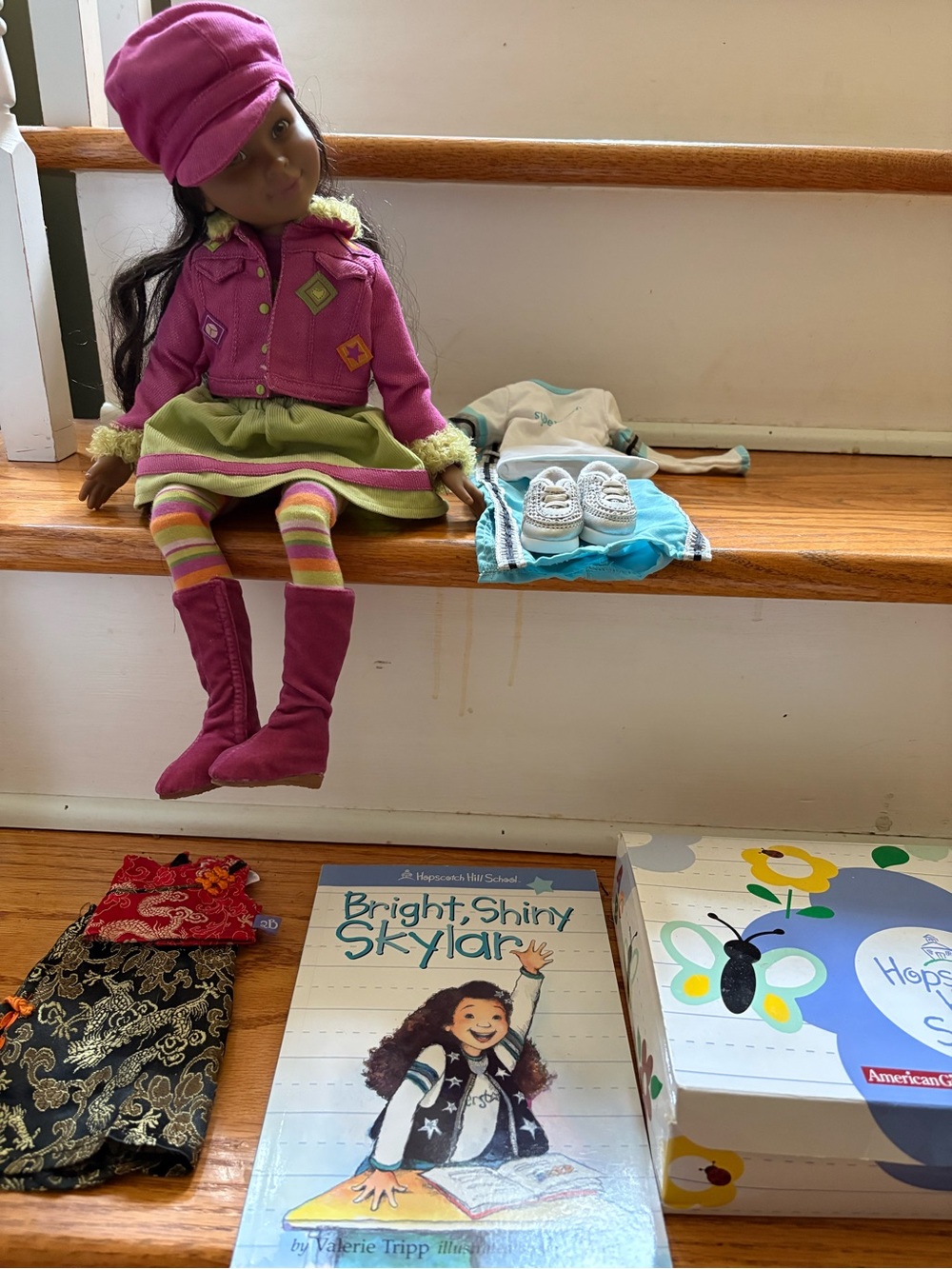 American Girl Doll in Bright Pink Jacket with Olive Green Skirt. Skylar